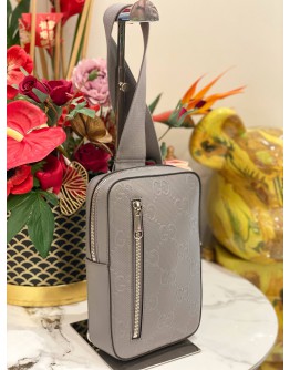 (LIKE NEW) GUCCI SLING BACKPACK IN GREY GG EMBOSSED CALFSKIN LEATHER
