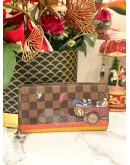 LOUIS VUITTON DAMIER EBENE CHRISTMAS ANIMATION COLLECTION CANVAS LONG ZIPPY WALLET
