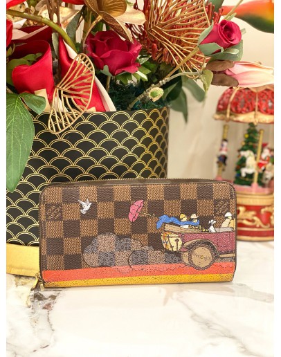 LOUIS VUITTON DAMIER EBENE CHRISTMAS ANIMATION COLLECTION CANVAS LONG ZIPPY WALLET