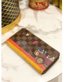 LOUIS VUITTON DAMIER EBENE CHRISTMAS ANIMATION COLLECTION CANVAS LONG ZIPPY WALLET