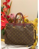 LOUIS VUITTON PALLAS TOP HANDLE AND SHOULDER BAG IN BROWN MONOGRAM CANVAS WITH BURGUNDY CALFSKIN LEATHER