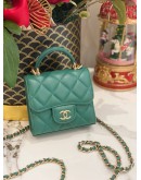 CHANEL MINI CHAIN TOP HANDLE BAG IN GREEN QUILTED LEATHER WITH GOLD TONED HARDWARE
