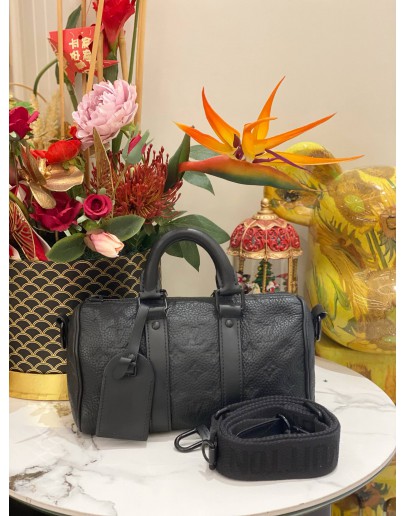 LOUIS VUITTON KEEPALL BANDOULIERE 25 IN EMPREINTE MONOGRAM LEATHER 