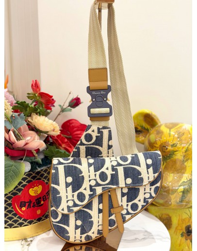 CHRISTIAN DIOR SADDLE IN BLUE OBLIQUE EMBROIDERY WITH TAN LEATHER TRIM