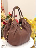 (LIKE NEW) LOUIS VUITTON MAHINA SURYA HOBO BAG IN BRONZE LEATHER 