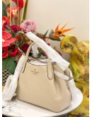 KATE SPADE SMALL DUMPLING IN BEIGE  BAG WITH STRAP 