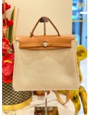2019 HERMES HERBAG ZIP 31 TOP HANDLE AND SHOULDER BAG IN CANVAS BEIGE AND GOLD VACHE HUNTER LEATHER 