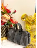 LOUIS VUITTON KEEPALL BANDOULIERE 25 IN BLACK DAMOFLAGE COATED CANVAS