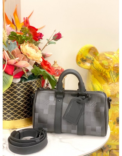 LOUIS VUITTON KEEPALL BANDOULIERE 25 IN BLACK DAMOFLAGE COATED CANVAS