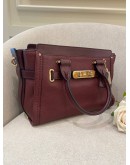 COACH SWAGGER CARRYALL BURGUNDY CROSSBODY AND SHOULDER HANDBAG WITH LONG STRAP