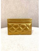 (BRAND NEW) CHANEL QUILTED CARD HOLDER LAMBSKIN GOLD COLOUR WITH GOLD AND PEARL CC LOGO