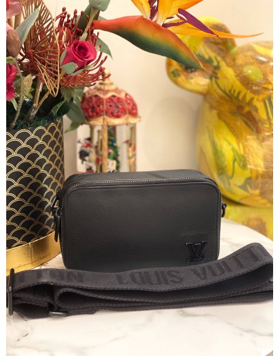 LOUIS VUITTON DISTRICT PM SLING BAG IN TAURILLON LEATHER