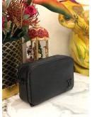 LOUIS VUITTON DISTRICT PM SLING BAG IN TAURILLON LEATHER