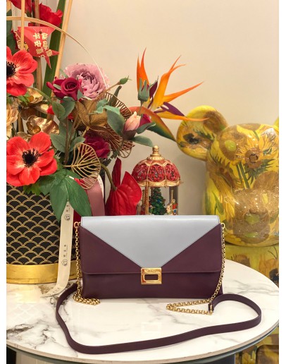 TOD'S PURPLE AND LIGHT BLUE CLUTCH WITH GOLD HARDWARE