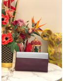 TOD'S PURPLE AND LIGHT BLUE CLUTCH WITH GOLD HARDWARE