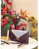 TOD'S PURPLE AND LIGHT BLUE CLUTCH WITH GOLD HARDWARE