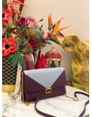 TOD'S PURPLE AND LIGHT BLUE CLUTCH WITH GOLD HARDWARE