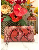JUDITH LEIBER EXPLORES CRYSTAL AND EXOTICE IN MUTICOLOR PYTHON LEATHER DINNER CLUTCH