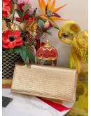 YSL YVES SAINT LAURENT METALLIC LIZARD EMBOSSED CLASSIC MONOGRAM KATE TASSEL CLUTCH GOLD