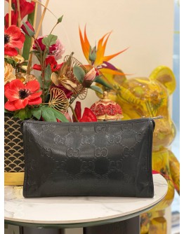 GUCCI EMBOSSED MONOGRAM POUCH