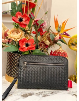 BOTTEGA VENETA INTRECCIATO LEATHER ZIPEED CLUTCH IN BLACK