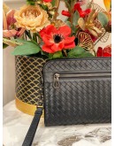 BOTTEGA VENETA INTRECCIATO LEATHER ZIPEED CLUTCH IN BLACK