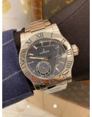 2016 CORUM ROMULUS POWER RESERVE REF 02.0001 BLUE DIAL WITH BLUE ROMAN NUMERAL BEZEL 42MM AUTOMATIC WATCH